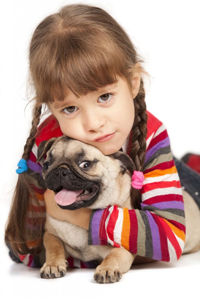 child with pug